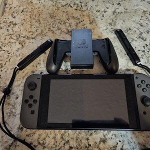 Nintendo Switch with Gray Joy-Con Controllers, Joy Con Grip, And 2 Games. No Doc